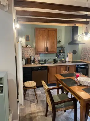 Cuisine ou kitchenette dans l'établissement Le chalet du cœur