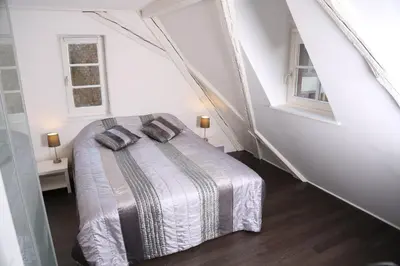 Un ou plusieurs lits dans un hébergement de l'établissement My Sweet Homes - La Grenouillère HYPERCENTRE