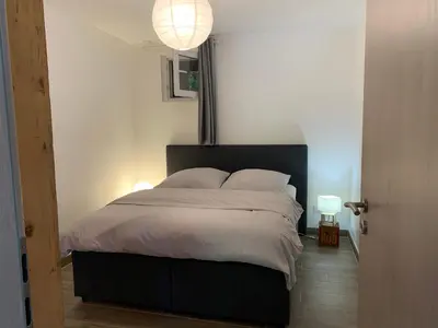 Un ou plusieurs lits dans un hébergement de l'établissement Gite Le Clos Doré à Beblenheim Parking privé