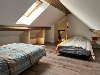 Un ou plusieurs lits dans un hébergement de l'établissement La petite maison