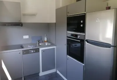 Cuisine ou kitchenette dans l'établissement P' TI ECRIN DE VERDURE