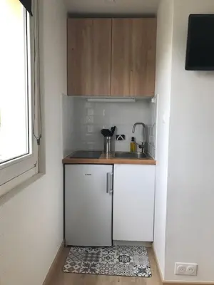 Cuisine ou kitchenette dans l'établissement Happy Cosy