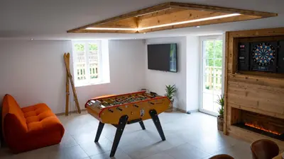 Télévision ou salle de divertissement dans l'établissement La ferme de la Rayée 1869