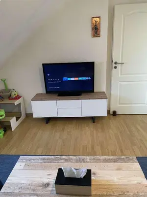 Télévision ou salle de divertissement dans l'établissement Joli appartement avec place de parking Privé