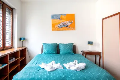 Un ou plusieurs lits dans un hébergement de l'établissement La Maison de maître - centre historique - 3 rue henriette