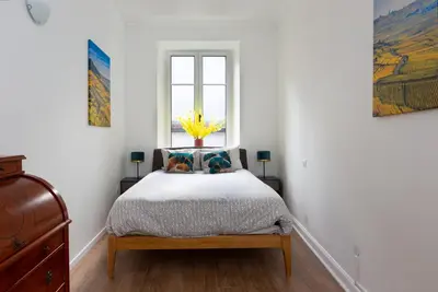Un ou plusieurs lits dans un hébergement de l'établissement La Maison de maître - centre historique - 3 rue henriette
