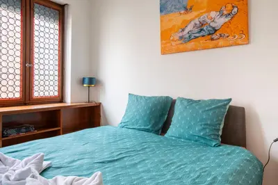 Un ou plusieurs lits dans un hébergement de l'établissement La Maison de maître - centre historique - 3 rue henriette
