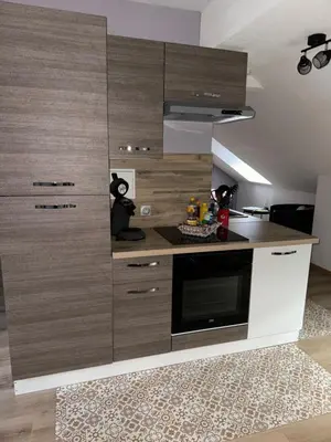 Cuisine ou kitchenette dans l'établissement Au p’tit nid douillet de Léa