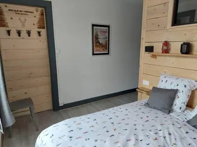 Un ou plusieurs lits dans un hébergement de l'établissement L'escale du centre du lac, joli appartement T2, proche lac