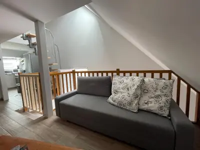Coin salon dans l'établissement A l'ombre du figuier