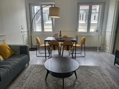 Coin salon dans l'établissement Appartements Rue du Chêne