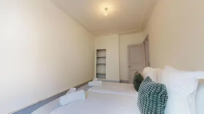 Un ou plusieurs lits dans un hébergement de l'établissement Appartements Rue du Chêne