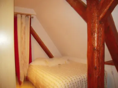 Un ou plusieurs lits dans un hébergement de l'établissement Bel appartement de charme de 70 m2