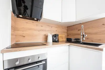 Cuisine ou kitchenette dans l'établissement L'Escapade Mulhousienne