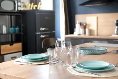 Cuisine ou kitchenette dans l'établissement Appartement de l'Arsenal