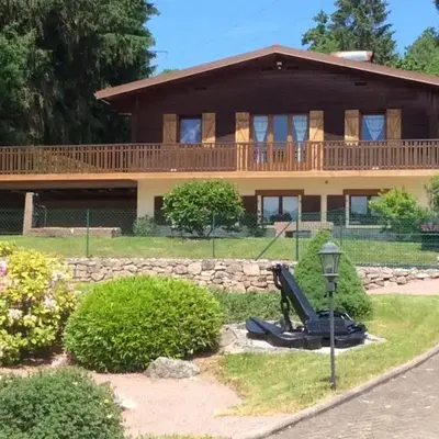 Chalet du Cerf dans un cadre de verdure
