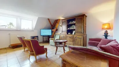 Télévision ou salle de divertissement dans l'établissement Le Clos de Charlotte