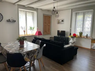 Coin salon dans l'établissement Appartement ravissant en bordure du Doubs