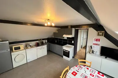 Cuisine ou kitchenette dans l'établissement Appartement indépendant à proximité de belfort