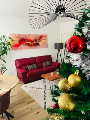 Coin salon dans l'établissement appartement cosy et lumineux avec parking gratuit