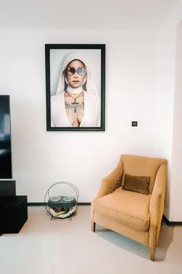 Coin salon dans l'établissement Grand appartement rez de jardin