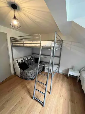 Un ou plusieurs lits dans un hébergement de l'établissement Appartement 6/8 pers Le Petit Bertin