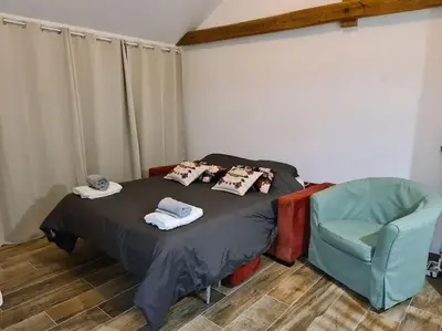 Un ou plusieurs lits dans un hébergement de l'établissement Appartement Proche Aéroport Bâle/Mulhouse