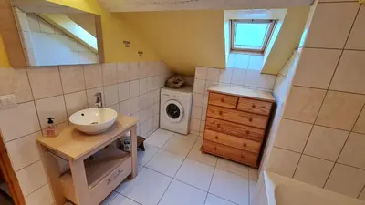 Salle de bains dans l'établissement DOMAINE DES GRAVIERS
