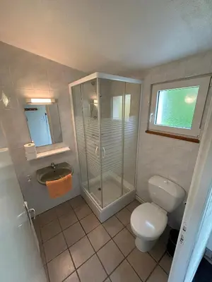 Salle de bains dans l'établissement Camping du Château