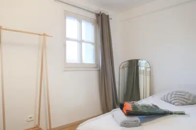 Un ou plusieurs lits dans un hébergement de l'établissement Le Tropical, Chic & Design