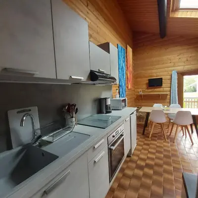 Cuisine ou kitchenette dans l'établissement chalet de la Cercenée