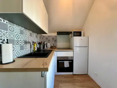 Cuisine ou kitchenette dans l'établissement La Cour de Clemenceau