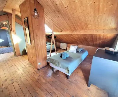 Coin salon dans l'établissement Maison Les Planches