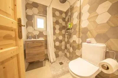 Salle de bains dans l'établissement Le Chant du Ruisseau SPA - Sauna