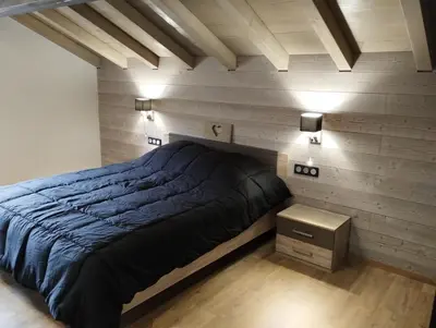 Un ou plusieurs lits dans un hébergement de l'établissement Superbe Chalet Neuf