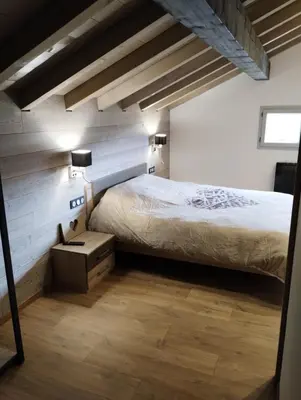 Un ou plusieurs lits dans un hébergement de l'établissement Superbe Chalet Neuf
