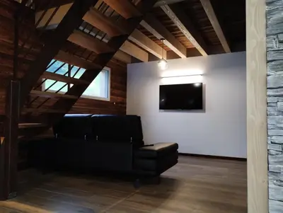 Coin salon dans l'établissement Superbe Chalet Neuf