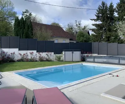 Piscine de l'établissement Superbe villa avec piscine proche de belfort ou située à proximité