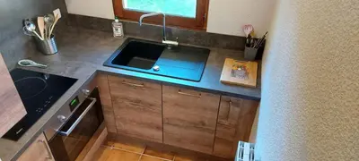 Cuisine ou kitchenette dans l'établissement La Scierie