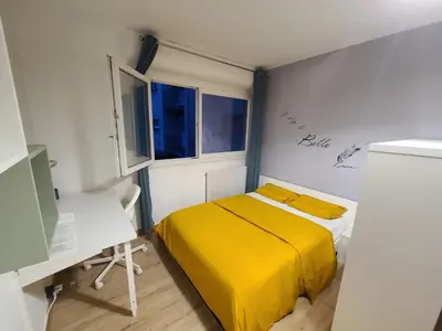 Un ou plusieurs lits dans un hébergement de l'établissement Magnifique Studio 26m2