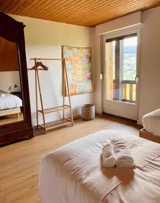 Un ou plusieurs lits dans un hébergement de l'établissement Chalet Alto