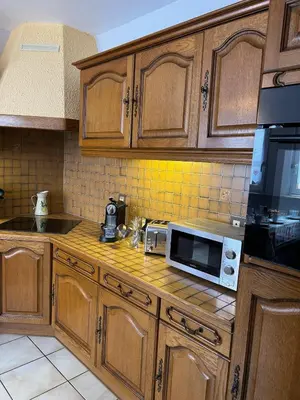Cuisine ou kitchenette dans l'établissement Le petit coin des oliviers