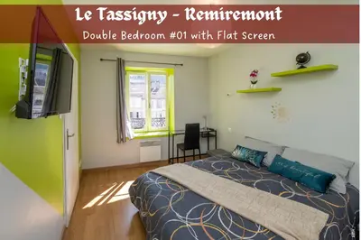 Un ou plusieurs lits dans un hébergement de l'établissement Le Tassigny 3 étoiles - Hyper-Centre Balneo Wifi Parking