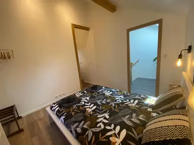 Un ou plusieurs lits dans un hébergement de l'établissement Duplex le Corten, Terrasse et jardin