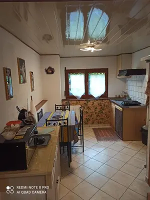 Cuisine ou kitchenette dans l'établissement Le bien vivre