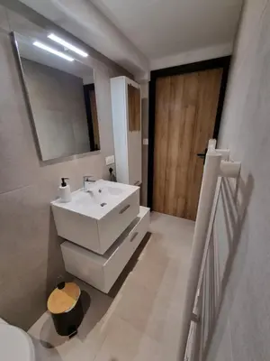 Salle de bains dans l'établissement Résidence cosy et moderne