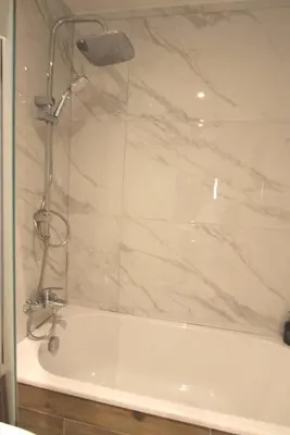 Salle de bains dans l'établissement Maison cossue, moderne et calme à La Bresse 5 chbr