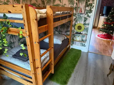 Un ou plusieurs lits dans un hébergement de l'établissement Gite de l'Ours