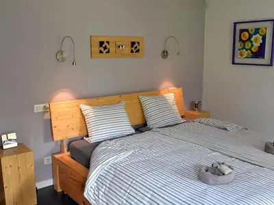 Un ou plusieurs lits dans un hébergement de l'établissement Loft charmant à Leymen près de Bâle - Parking, espace vert, tout confort inclus - FR-1-744-7