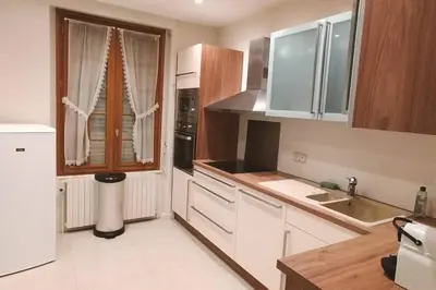 Cuisine ou kitchenette dans l'établissement Appartement au pied du château